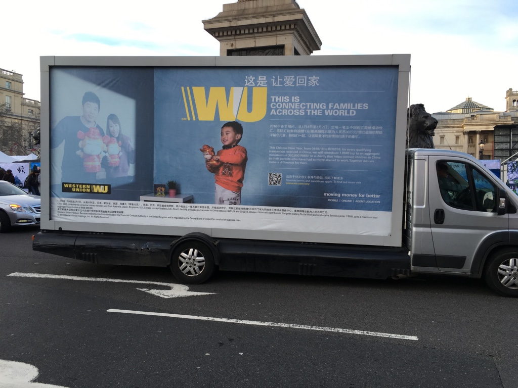 Western Union ad truck parked at Trafalgar Square